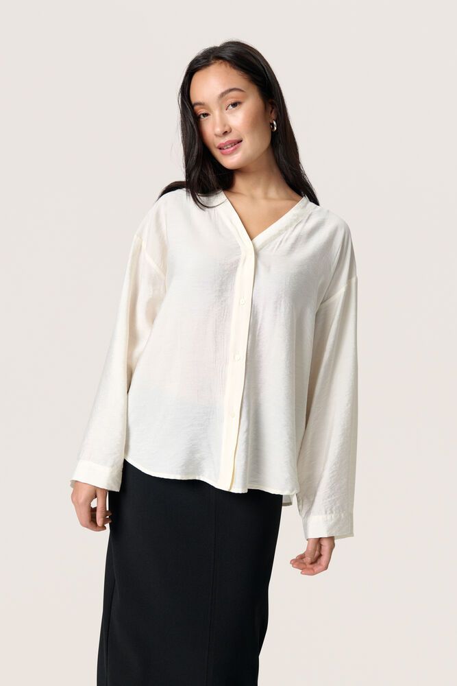 viskos topp i vit med knappar